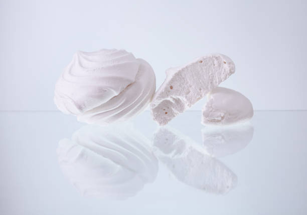 istock Pieces of marshmallows on a light background 665047660