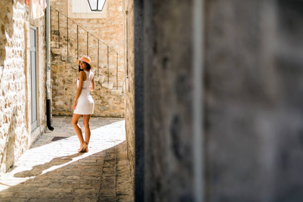 istock Beautiful model posing in a narrow passage 665052198