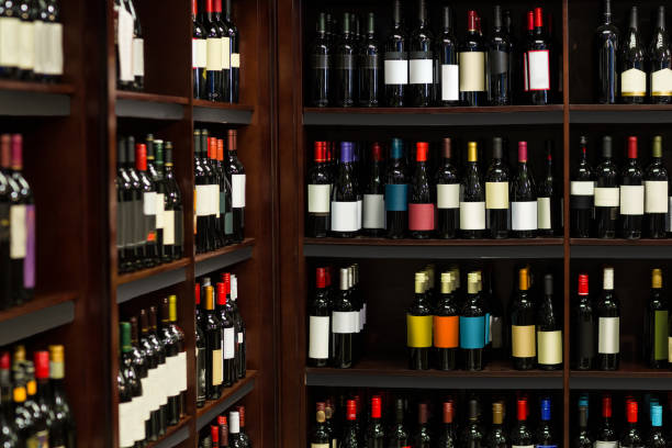 View of row bottles of wine in supermarket