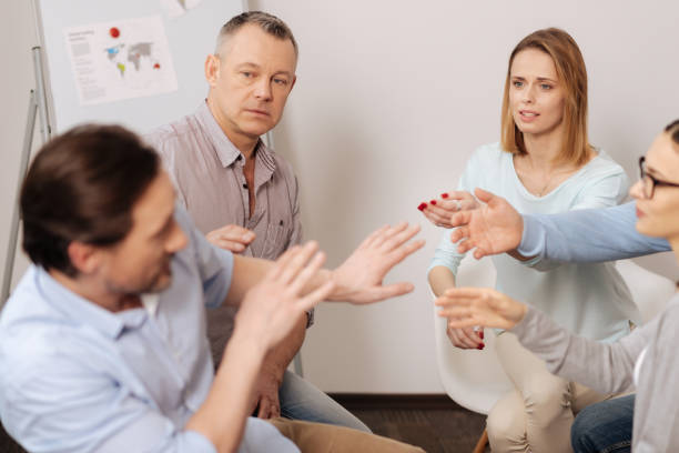 istock Group of people being surprised from their coworker 665060592