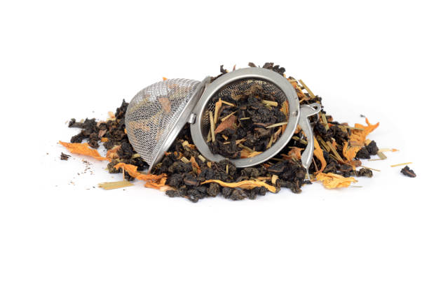 istock Tea Infuser Ball with herbal organic lemon grass flowers 665064802