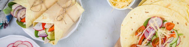 istock Tortilla wrap with chicken and vegetables 665071784