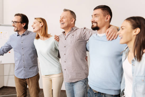 istock Profile photo of happy workers posing in file 665077160