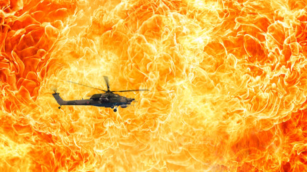 istock Combat helicopter on a fiery background, Fire flames 665081276