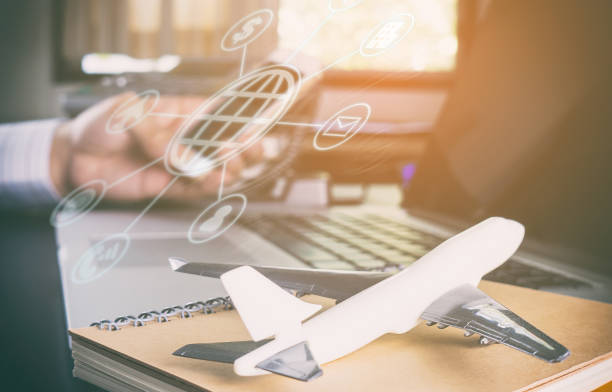istock Business man booking online flight on smartphone 665088142
