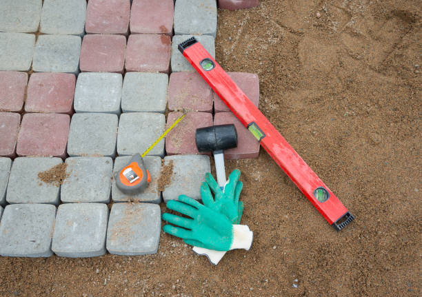 istock stone blocks rubber hammer level gloves and tape measure 665088844