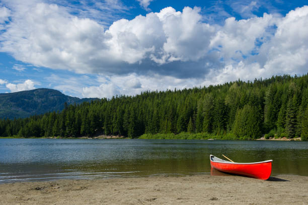 istock Canoe at a mountain lake 665107188