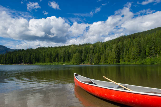 istock Canoe at a mountain lake 665107304