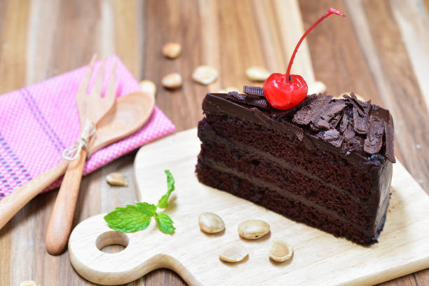 istock chocolate cake on wooden plate 665112008