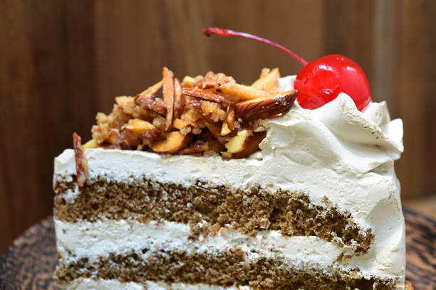 close-up of genoise coffee cake on wooden plate