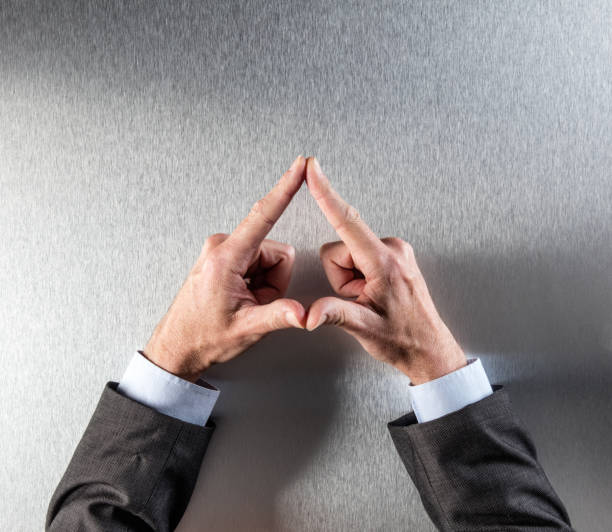 istock man business hand gesture for symbol of stability, security or reflection 665112986