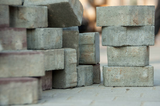 istock Laying paving slabs on the street 665116990