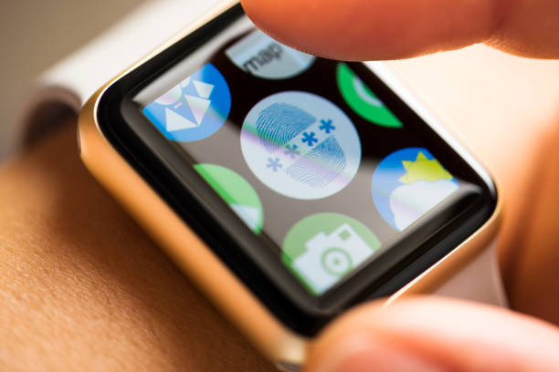 istock Finger touching fingerprint password app icon on smart watch screen 665124884