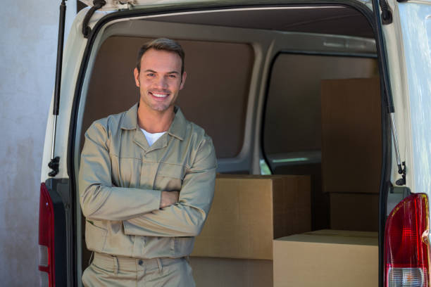 istock Portrait of a happy delivery man 665131642
