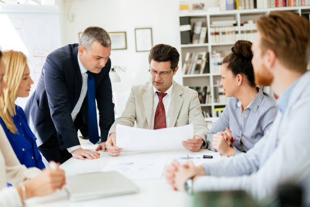 istock Business people discussing future plans in modern office 665140162