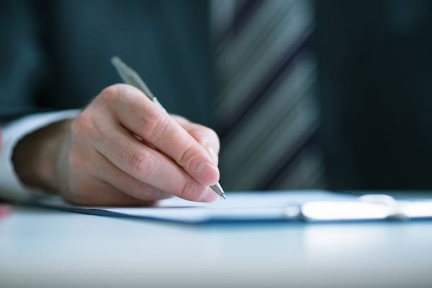 istock Business concept: businessman signs a contract 665157498