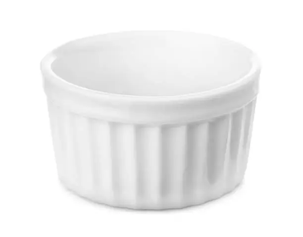 Small glazed ceramic ramekin isolated on white