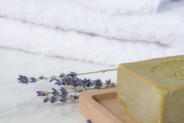 istock Soap, lavender and white towels 665162824