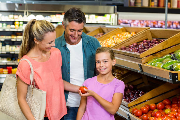 istock Young family doing some shopping 665163032