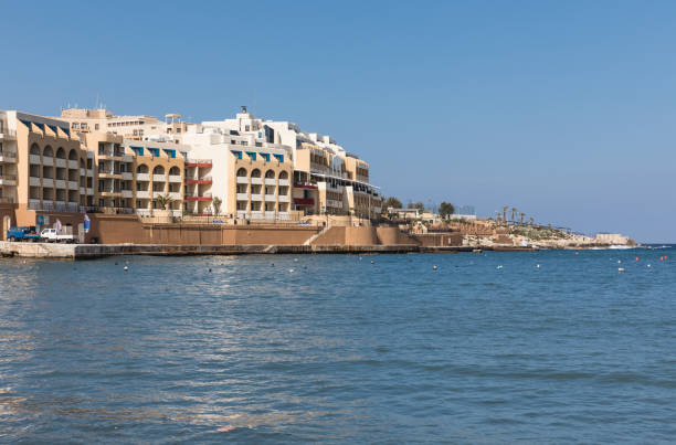 Marina Hotel Corinthia Beach Resort, Malta ST. JULIAN'S - MALTA, 29 March 2017: Marina Hotel Corinthia Beach Resort located at the edge of the sparkling Mediterranean and is the perfect retreat for an island holiday st julians bay stock pictures, royalty-free photos & images