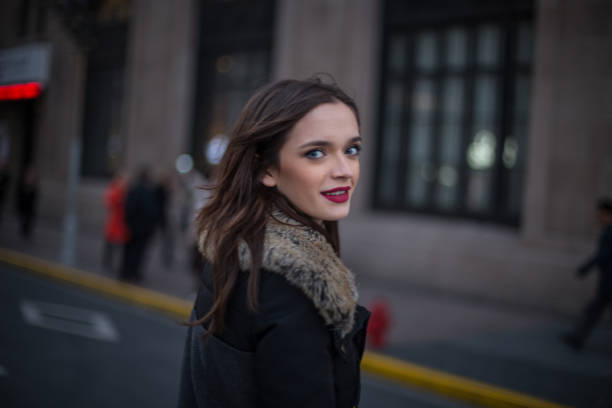 istock Brunette girl with red lipstick 665173736