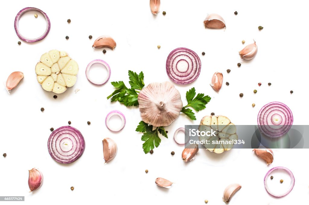 garlic, red onion, parsley and pepper isolated on white background garlic, red onion, parsley and pepper isolated on white background. top view Garlic Stock Photo