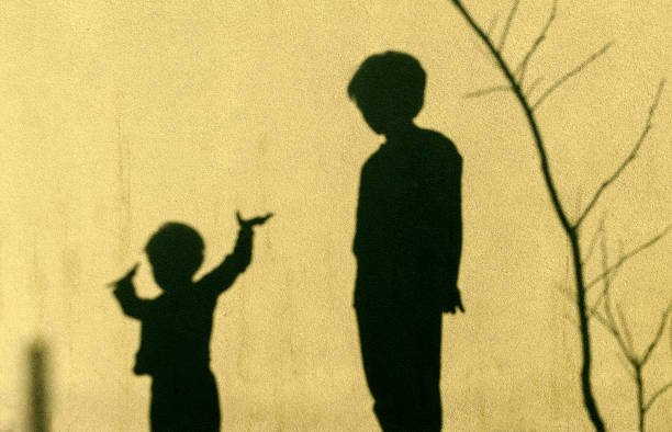 istock Shadows of kids 665181728