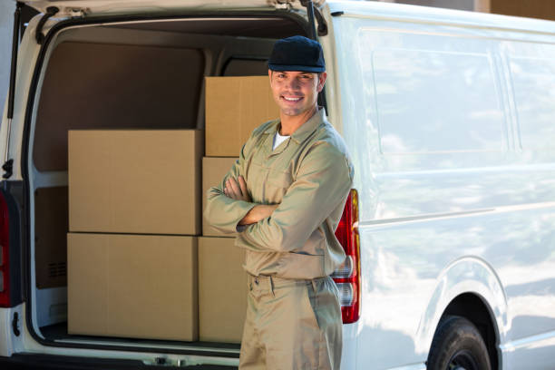istock Portrait of a happy delivery man 665192594