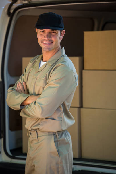 istock Portrait of a happy delivery man 665192946
