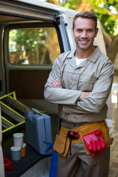 istock Handyman with tool belt around waist 665196782