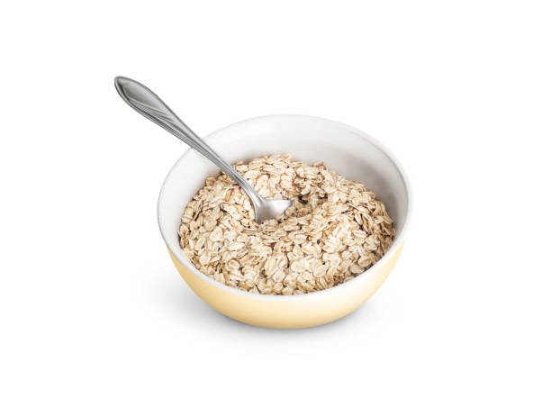 istock Oatmeal or dry cereal in a yellow bowl 665197886