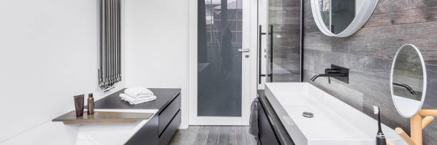 istock Bathroom with wood effect tiles 665212198