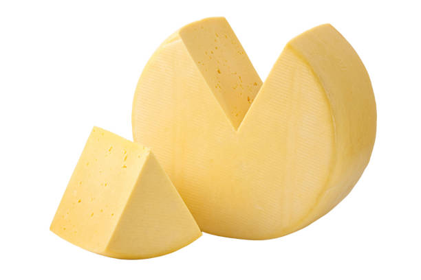 cheese wheel and sector isolated with clipping path - cheese wheel cheese cheddar wheel imagens e fotografias de stock