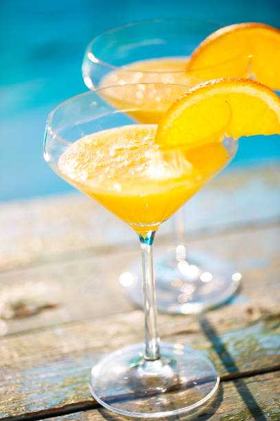 Champagne glasses with orange slice Mimosa cocktail