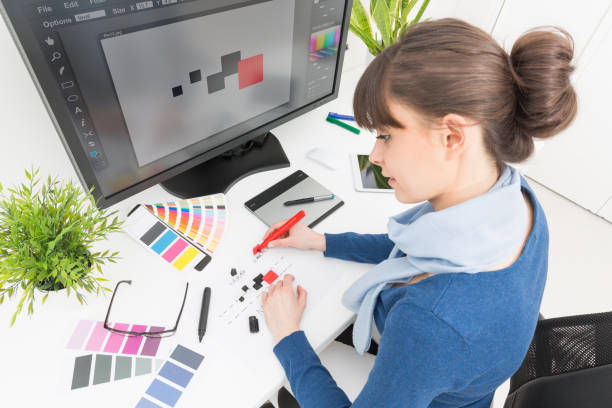 istock Graphic designer at work. Color samples. NOTE TO INSPECTOR: I am the author of everything that you see in the image (interface program on the screen - property release added). 665219074