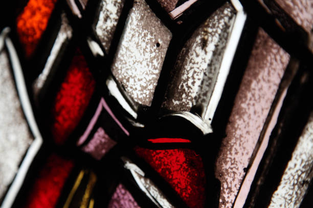 istock multi color stained glass windwow background abstract lines light spectrum church decor element 665221962