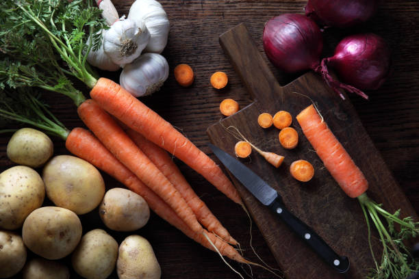 Bunch of carrots, red onions. stock photo