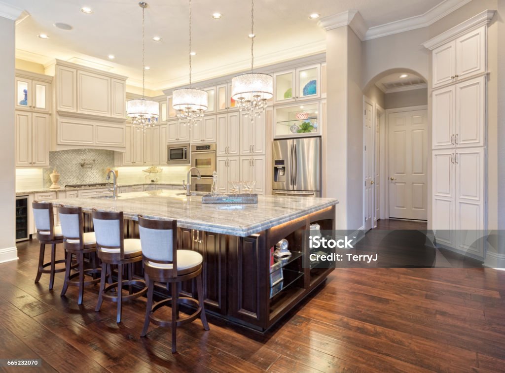 Regional Luxury Houses Beautiful Custom Kitchen with Island in Estate Home Kitchen Stock Photo