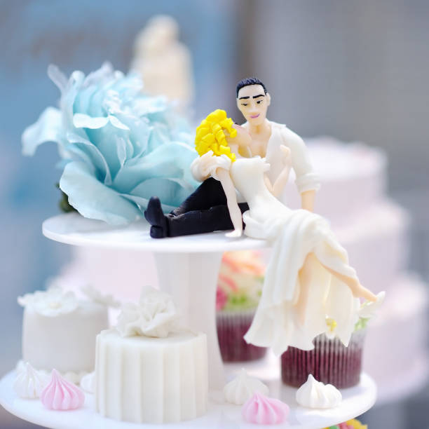 istock Funny figurines bride and groom 665232596