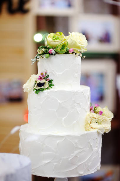 istock Traditional anniversary/wedding multi-layer cake with flowers 665235022
