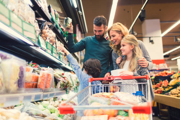 istock Family shopping in supermarket 665242574