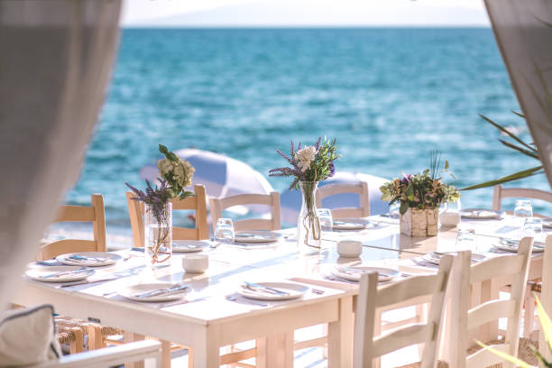 istock table for lunch on the beach at Greece 665245648