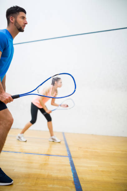 istock Woman about to serve the ball 665248912