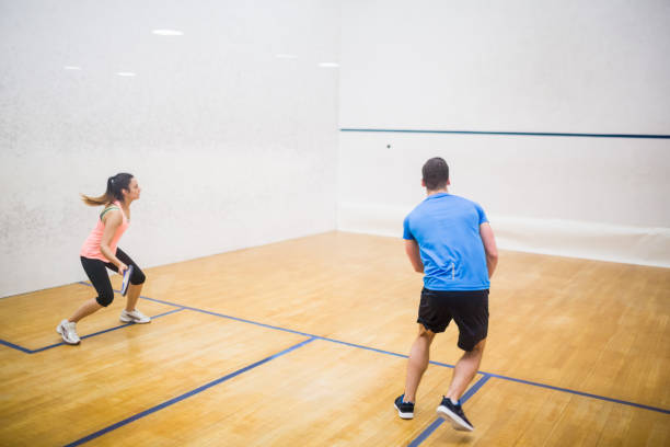 istock Couple enjoying a game of squash 665249332