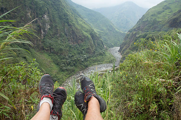 istock View of hikers' feet overlooking valley, mountains 665267849