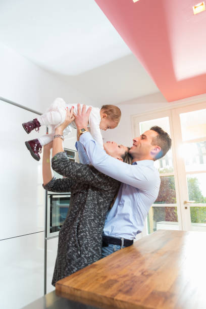 istock happy family in the kitchen 665271682