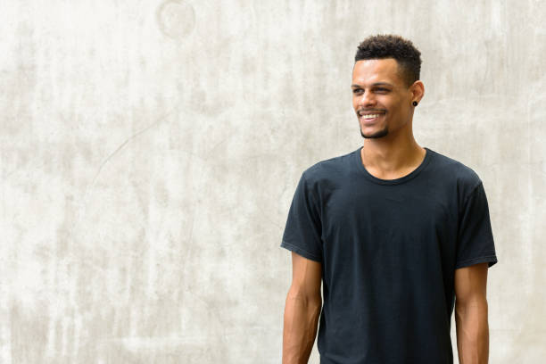 istock Thoughtful young happy handsome African man smiling 665280408