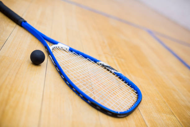 istock Close up of a squash racket and ball 665281356