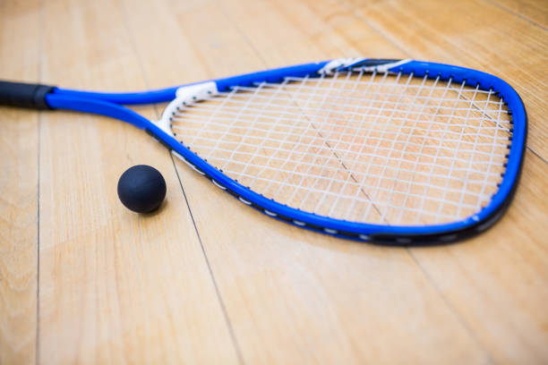 istock Close up of a squash racket and ball 665281382
