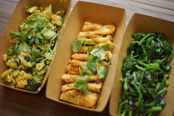 istock chinese food vegetables in paper boxes for takeout 665284074